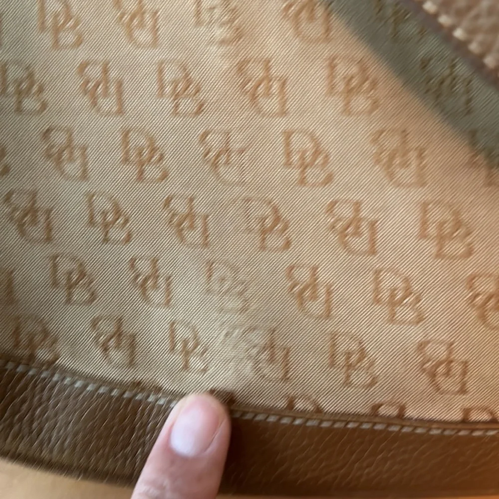 Dooney and Bourke classic monogram canvas and leather Tan color small hobo bag